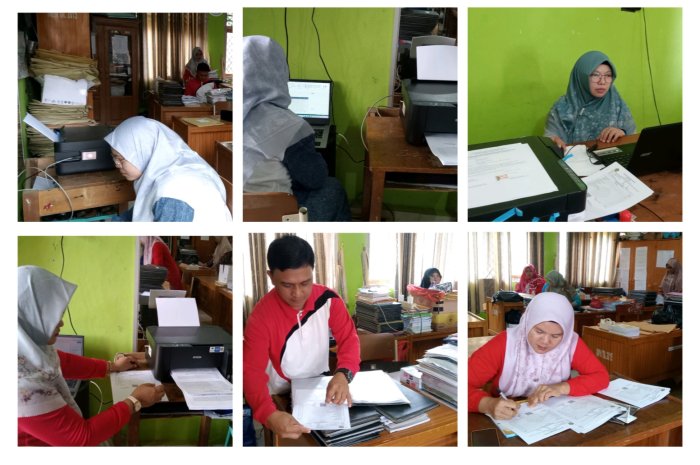 Dewan Guru MIN 1 Tebo Fokus Selesaikan Cetak Rapor Siswa di Madrasah Dewan Guru MIN 1 Tebo Fokus Selesaikan Cetak Rapor Siswa di Madrasah