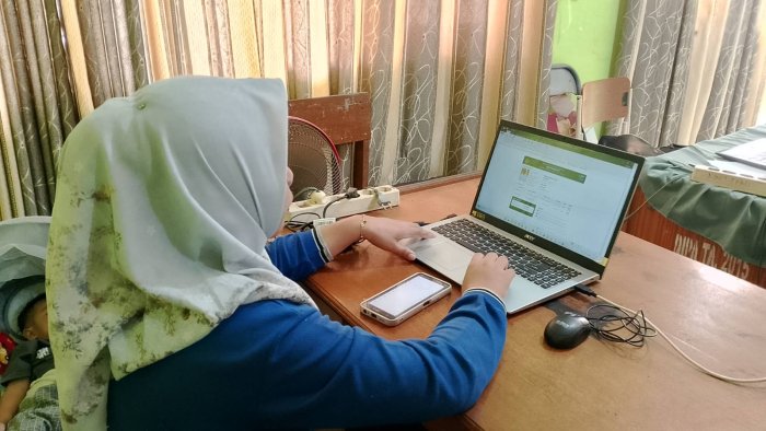 Operator MIN 1 Tebo Siapkan Data dan Cetak Kartu,Dukung Kelancaran Pelaksanaan OMI Tahun 2026